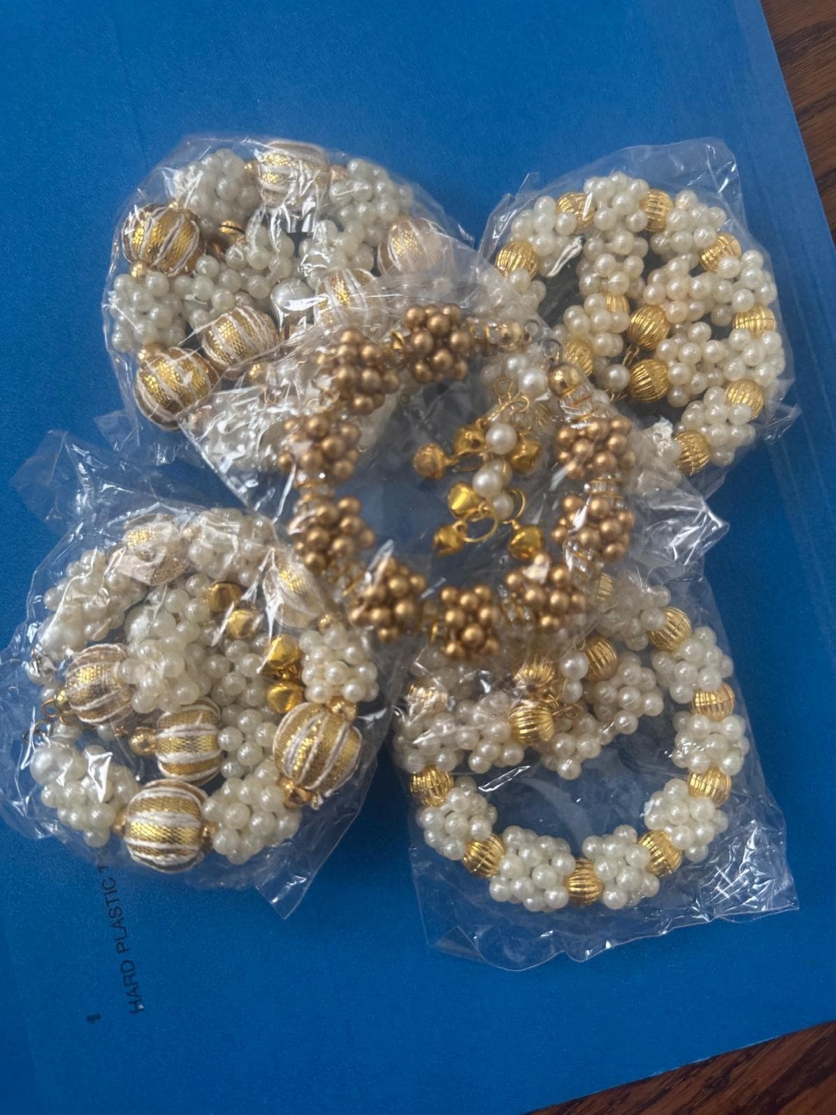 Elegant Pearl and Gold Rakhi Set