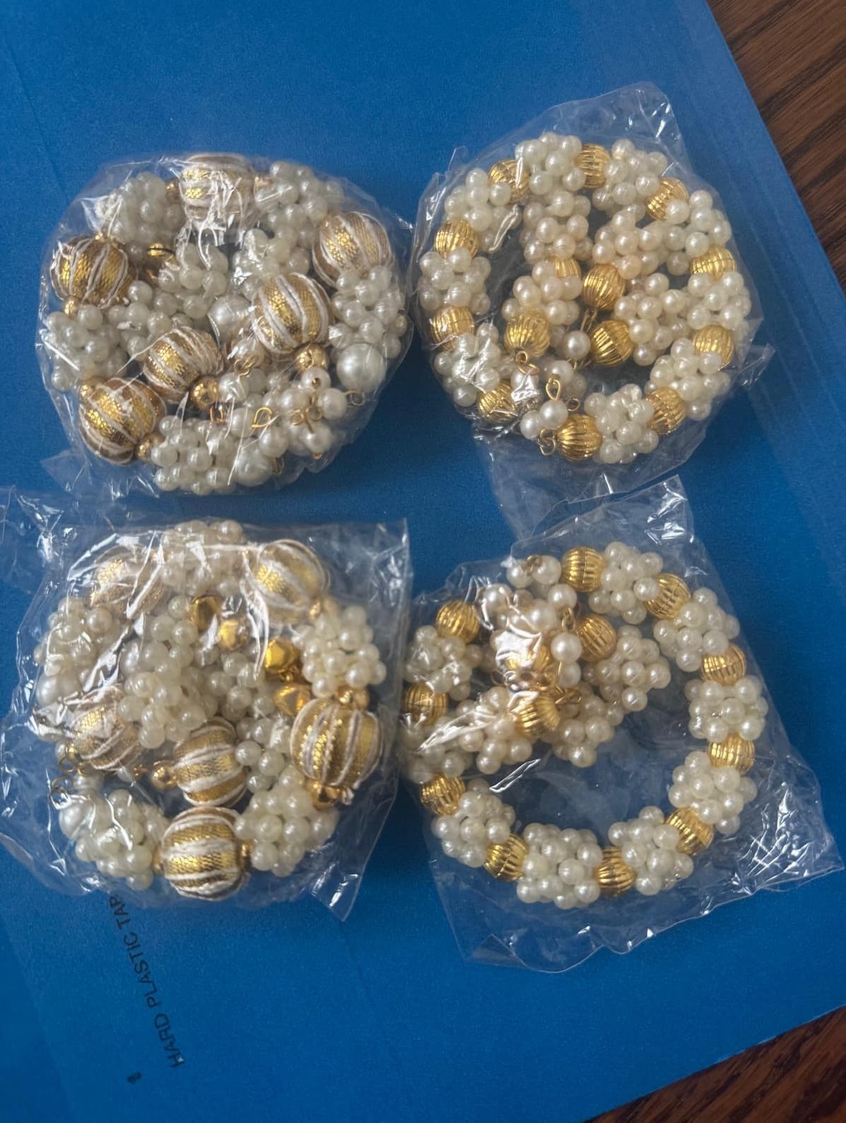Elegant Pearl and Gold Rakhi Set